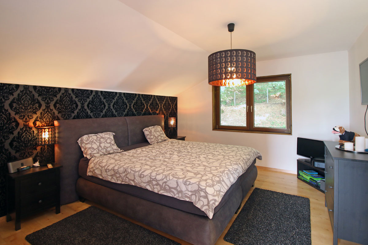 Eines-der-Schlafzimmer-im-Obergeschoss