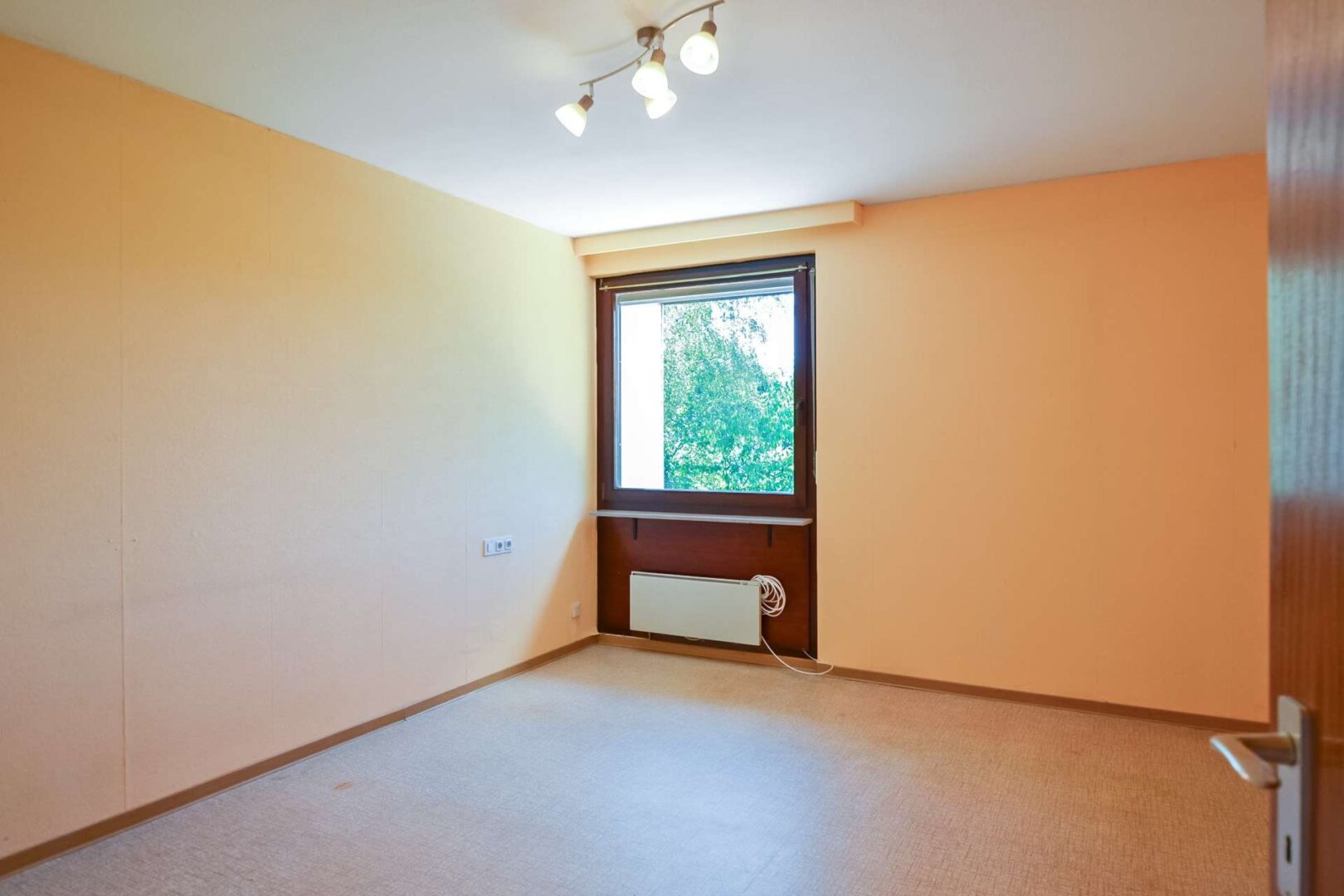 Schlafzimmer mit Blick ins Grüne